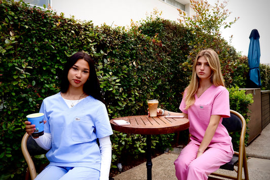 Healthcare professionals wearing lightweight scrubs suitable for hot weather in the UAE.