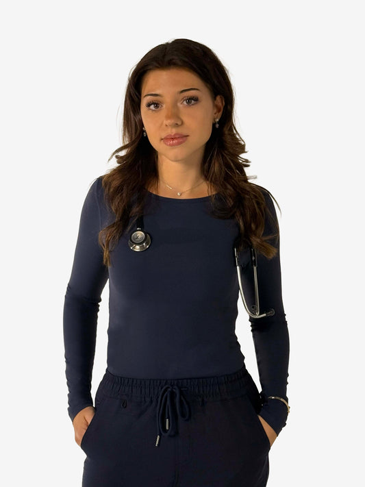 nurse wearing navy blue core underscrubs