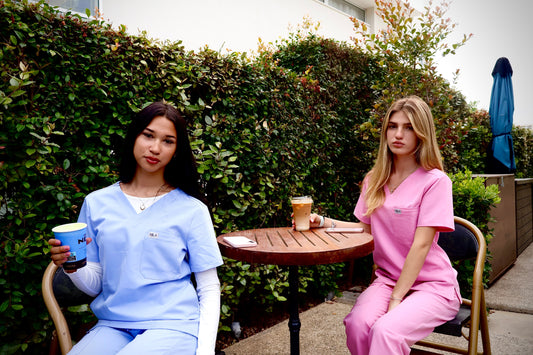 Healthcare professionals wearing lightweight scrubs suitable for hot weather in the UAE.