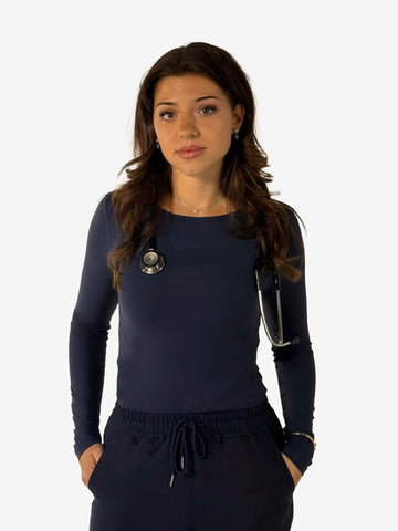 nurse wearing navy blue core underscrubs