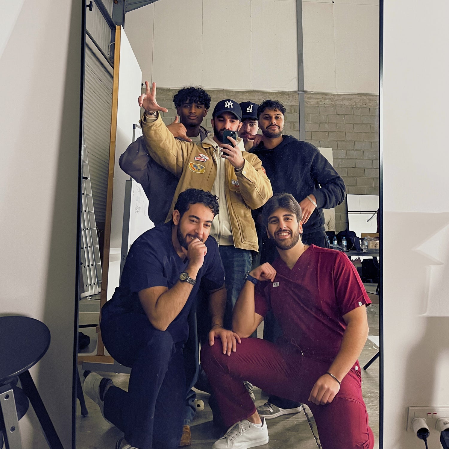 2 doctors wearing nila scrubs with patients 